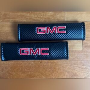 2 new GMC carbon fiber car seat belt cushioned pads